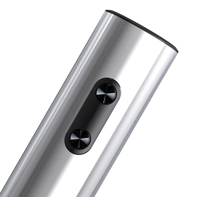 Close-up of a metallic cylindrical object with black accents on a white background