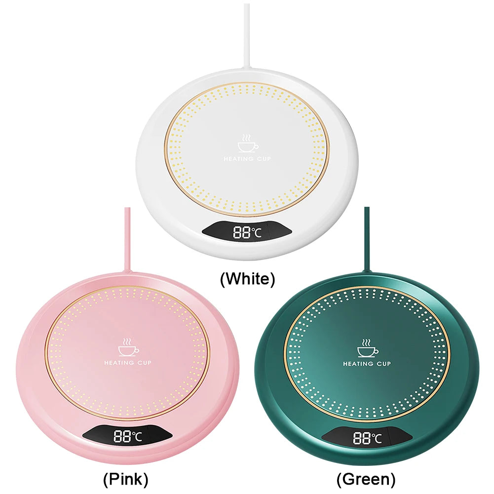 Three round heating pads in white, pink, and green on a white background.