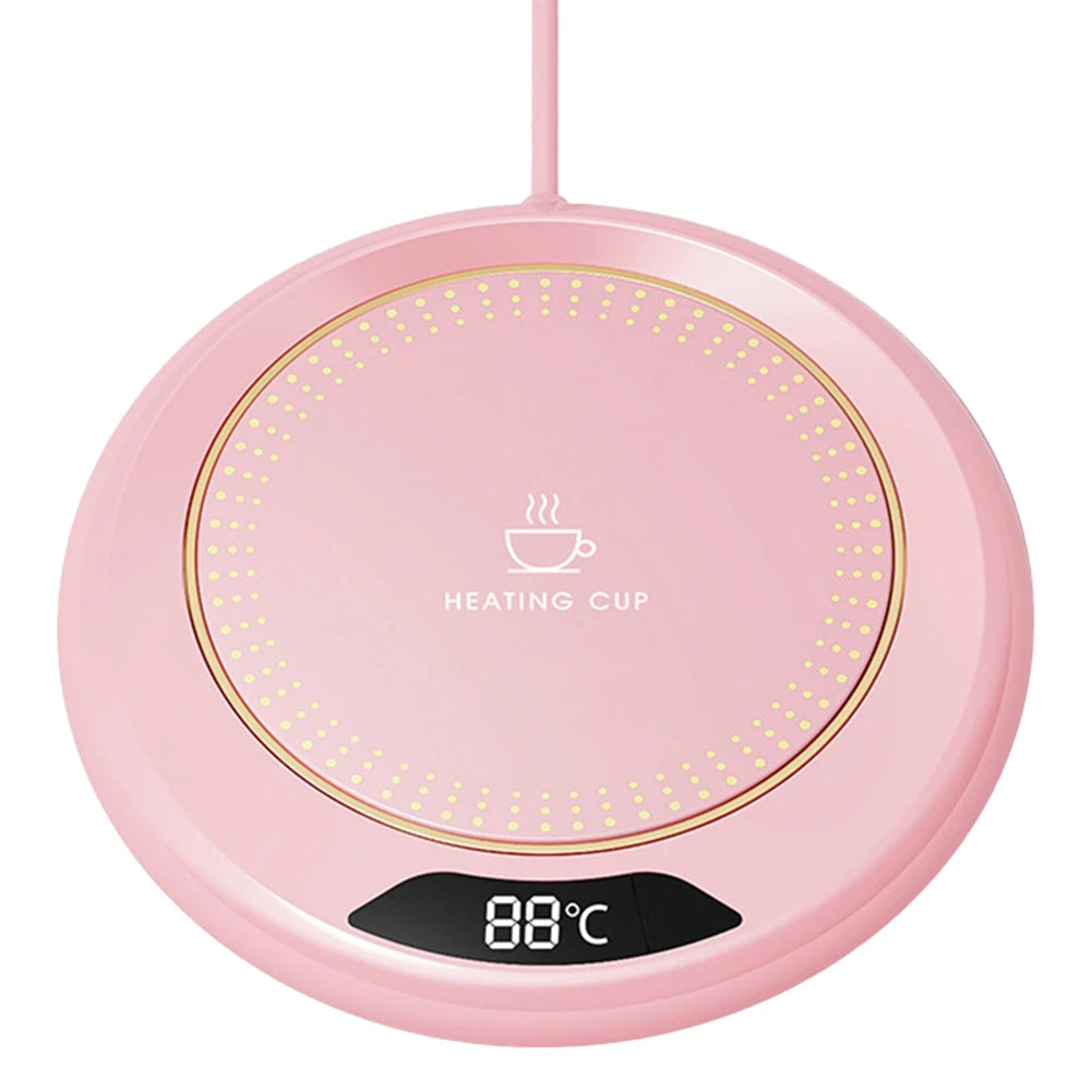 Pink heating cup with digital display on a white background